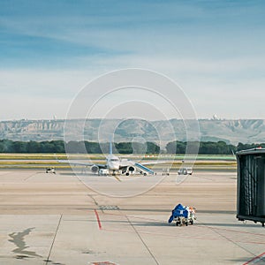 Generic airplane at the airport on the tarmac