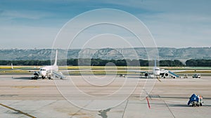 Generic airplanes at the airport on the tarmac