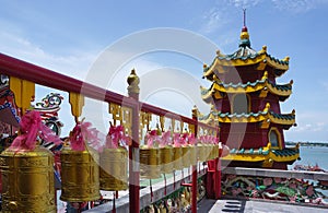 Generic Chinese layer pagoda with golden bell forground