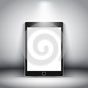 Generic electronic tablet on spotlit background