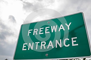 Generic Freeway Entrance sign with a grey sky