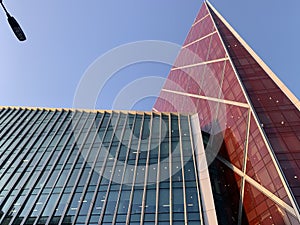 Generic glass buildings in London with beautiful clear blue sky , modern architecture