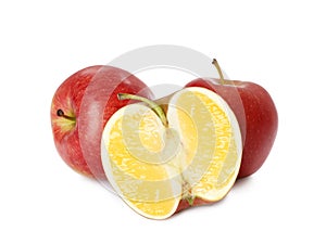 Genetically modified apples with lemon on white background