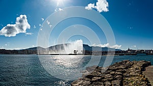 Geneva city center, lake and fountain on a sunny spring day