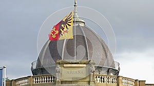 Geneva flag on Musee Ariana roof, Swiss Museum of Ceramics and Glass, slow-mo