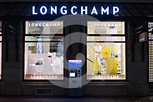 Longchamp fashion store, exposition, window shop with modern bags, clothes,