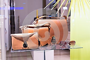 Longchamp fashion store, exposition, window shop with modern bags, clothes,