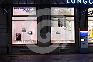 Longchamp fashion store, exposition, window shop with modern bags, clothes,