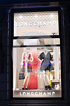 Longchamp fashion store, exposition, window shop with modern bags, clothes,