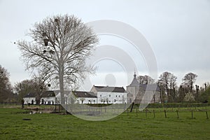 Genhoes Castle in Oud Valkenburg in the early spring fields