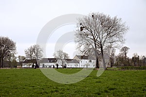 Genhoes Castle in Oud Valkenburg in the early spring fields