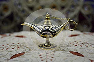 Genie lamp, old oil lamp with Arabic motifs