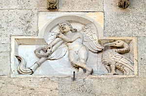 Genio Funerario with upside-down torch, Modena Cathedral photo