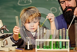 Genius kid. Joys and challenges raising gifted child. Teacher child test tubes. Chemical experiment. Genius minds. Signs