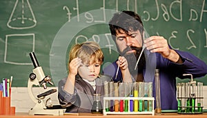 Genius kid. Teacher child test tubes. Chemical experiment. Achieving developmental milestones way before predicted sign