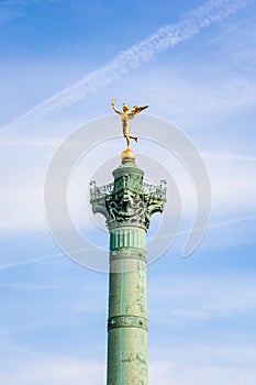 The Genius of Liberty golden statue atop the July Column in Paris, France