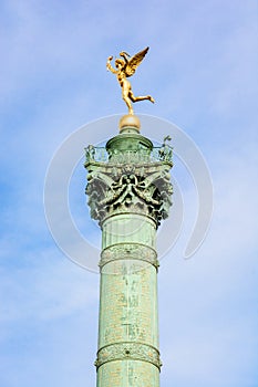 The Genius of Liberty golden statue atop the July Column in Paris, France