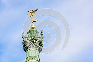 The Genius of Liberty golden statue atop the July Column in Paris, France