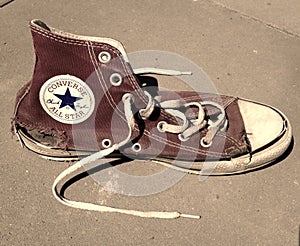 Used torn Converse All Stars