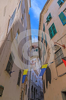 Genoa cityscape, Italy: narrow alleys of the historical center.