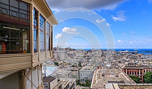 Genoa cityscape: panoramic view from Spianata Castelletto with the Art Nouveau public lift, Italy.