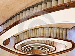 GENOA GENOVA, ITALY, January 11, 2018 View to the beautiful spiral staircase in building , Spiral circle staircase decoration
