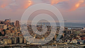 Genoa, Italy - 09 15 2020: Aerial view of the harbor. Time lapse