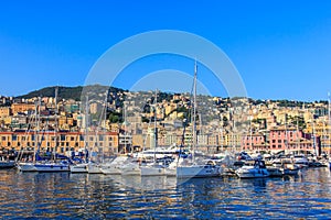 Genoa, Italy, sea port with ships and yachts photo