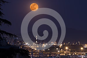 genoas lanterna under full moon photo