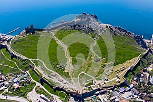 Genoese fortress in the Sudak bay on the Peninsula of Crimea. Aerial view
