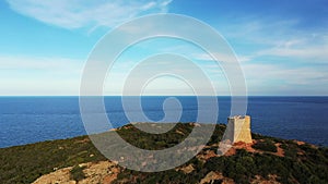 The Genoese tower above the rocky island of Pinarello