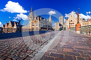 Gent, Belgium. Graslei and bell tower at River Leie, Flanders