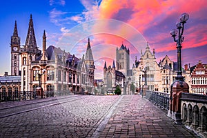 Gent, Belgium. Graslei historical downtown, River Leie and bridge Sint-Michielsplein photo