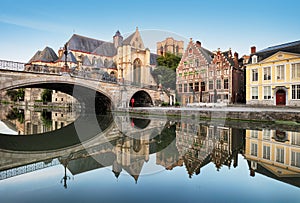 Gent - Medieval cathedral and bridge over a canal in Ghent, Belg