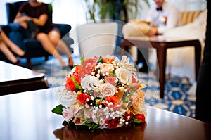 Gentle Bouquet of Flowers Lies on a Table Wedding Bouquet of Orange and Pink Flowers Lies on Table Close-up Copy Space