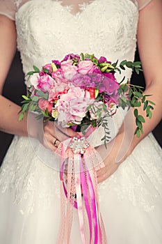 Gentle bridal bouquet in hands