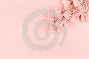 Gentle love pink hearts of chinese paper fans flying on pastel pink color as elegant curved stream, top view, copy space.