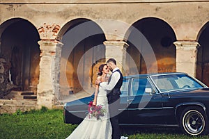 Gentle stylish groom and bride