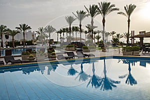 A gentle sunrise over the swimming pool