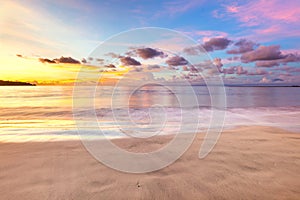 Gentle sunset above ocean, beautiful tropical clouds