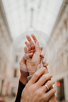 A gentle touch of the hands of a man and a woman close-up.