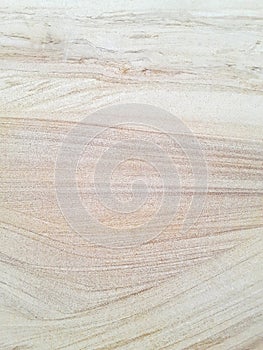 Gentle, water-like patterns in sandstone.