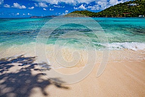 Gentle waves lap the beach at Hawksnest in St. John photo