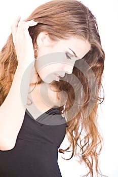 Gentle young woman touching her