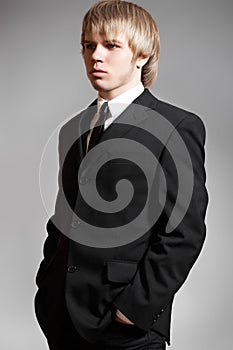 Gentleman business man model in elegant black suit