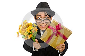 Gentleman with gift box and flowers isolated on