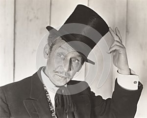 Gentleman tipping his hat