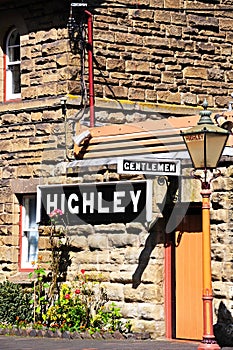 Gentlemen and Highley sign on station building.