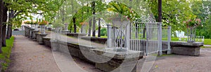 A gently-sloping ramp to the park from the Hanging Garden decorated with vases by cast-iron