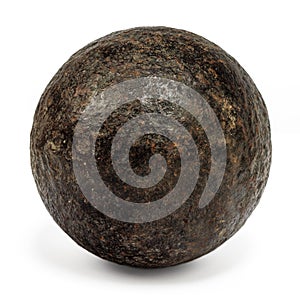 Genuine 18th century cannonball on white